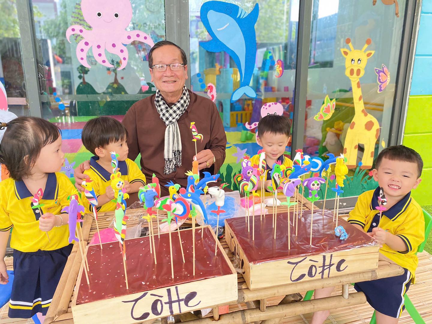 Kim Dong class – young child focused on creative drawing